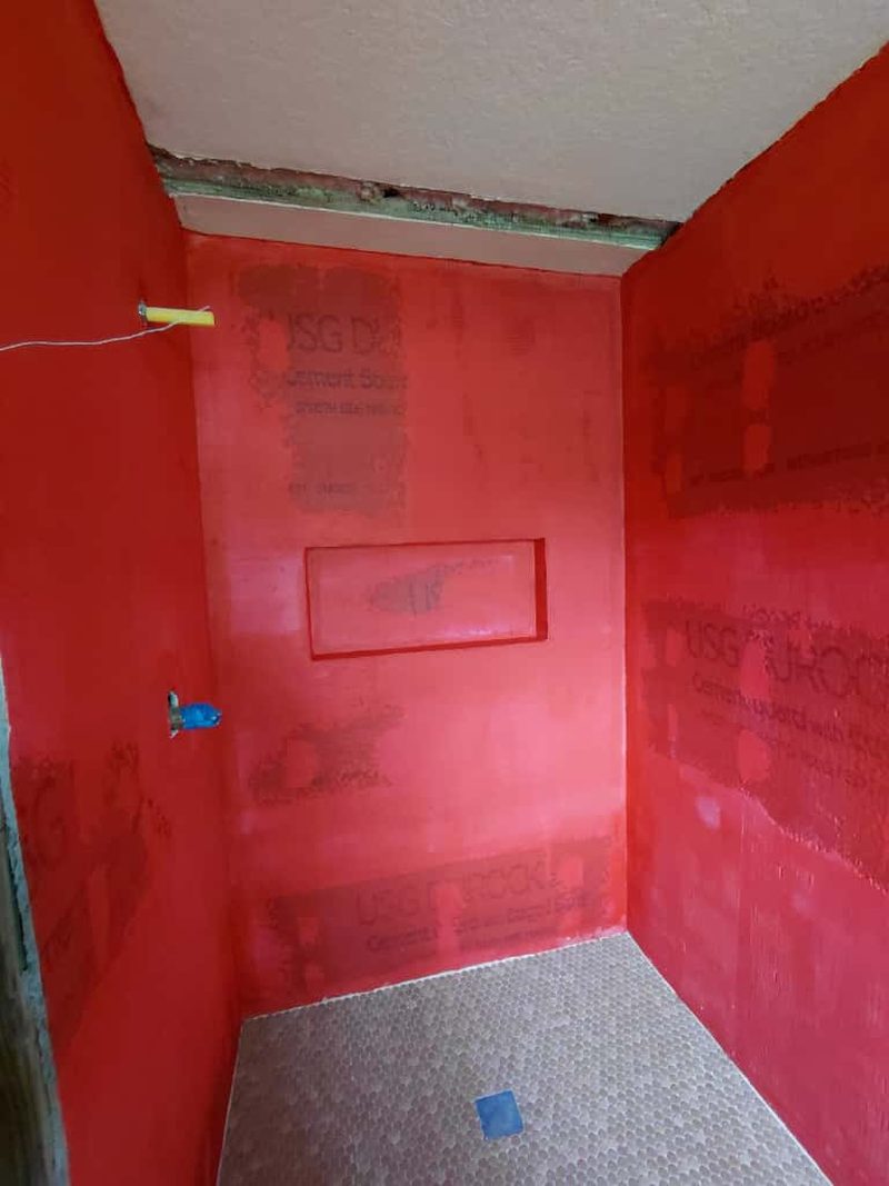 Shower walls waterproofed before tile goes on